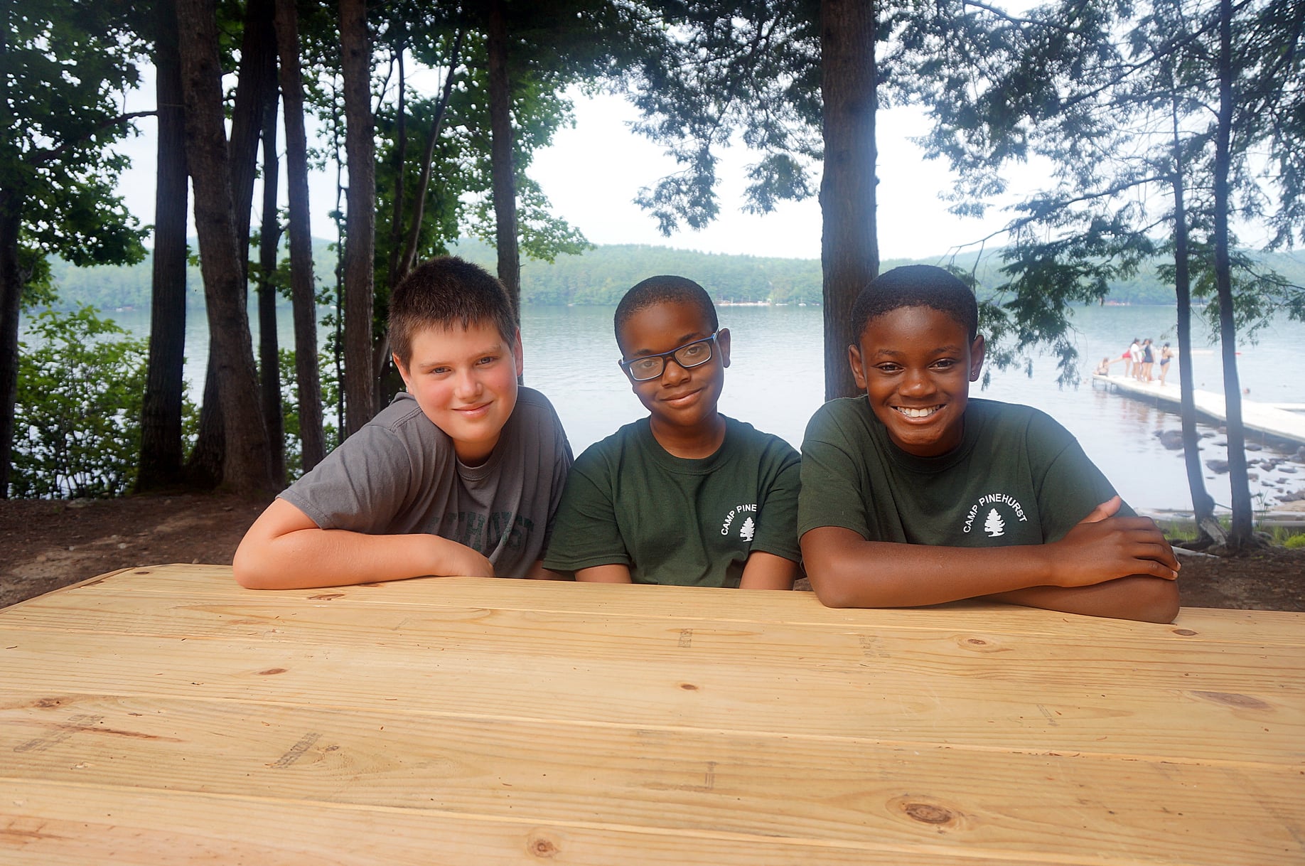 Kids at Camp Pinehurst lakeside