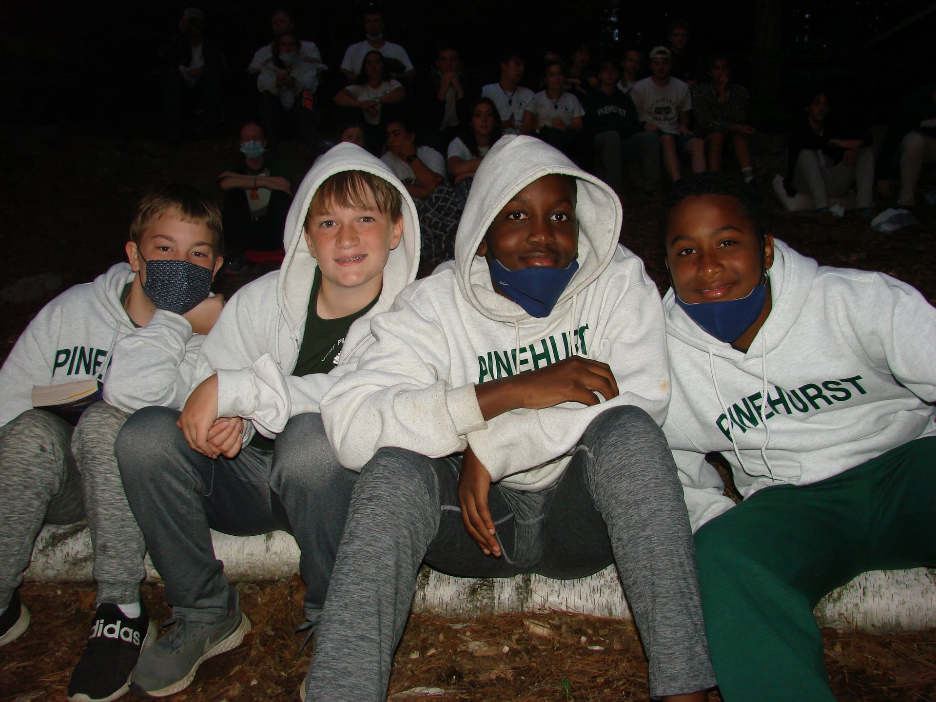Campers at nighttime campfire