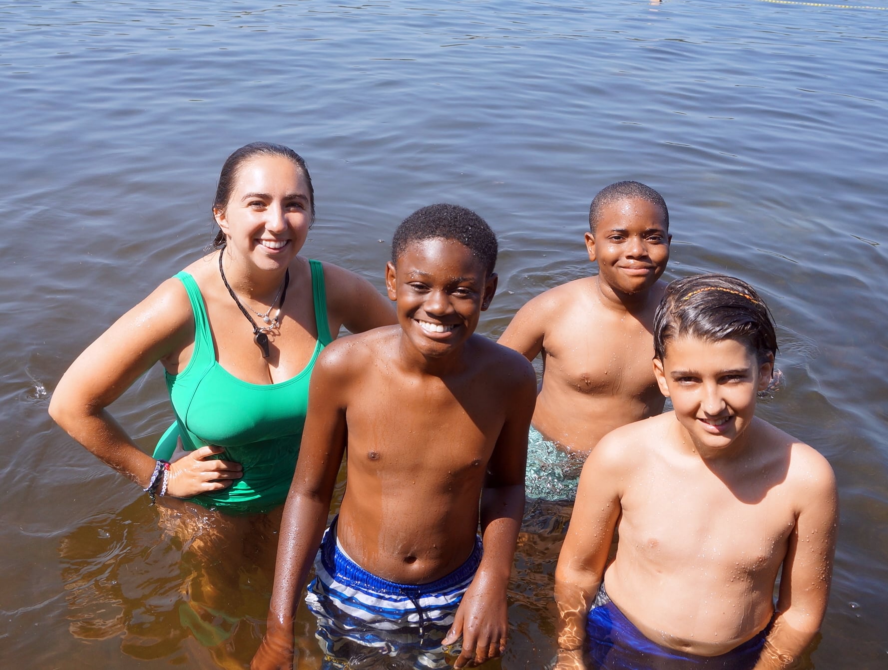 Kids swimming in Maine lake