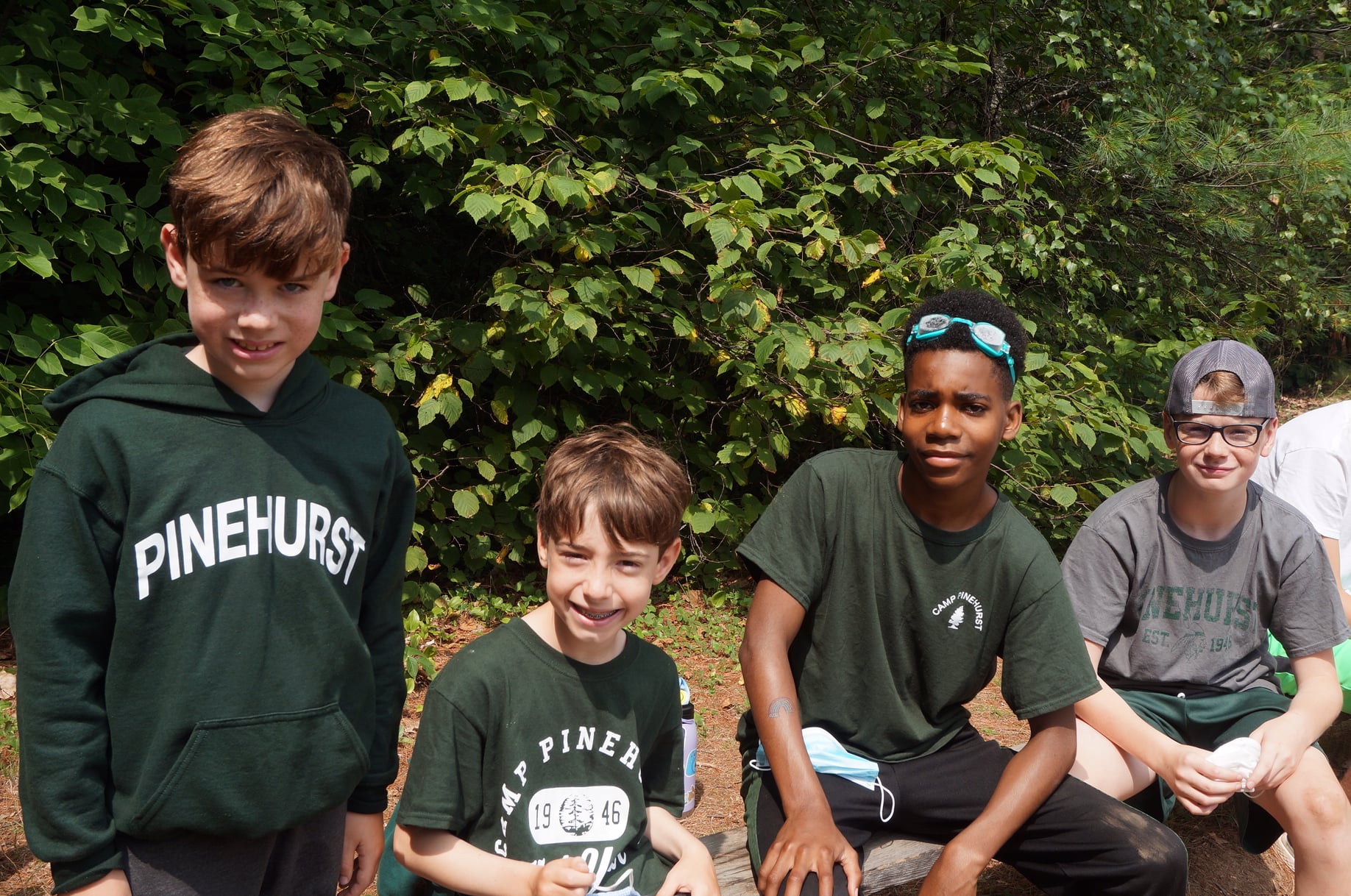Kids at Camp Pinehurst in woods